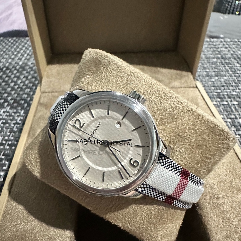 NWT BURBERRY LADY’S WATCH in black, red,light tan,cream and white. Round face. - Picture 3 of 13
